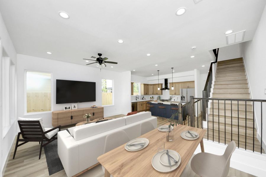 Open concept design - living room, dining area & kitchen view. Open concept design - living room, dining area & kitchen view.