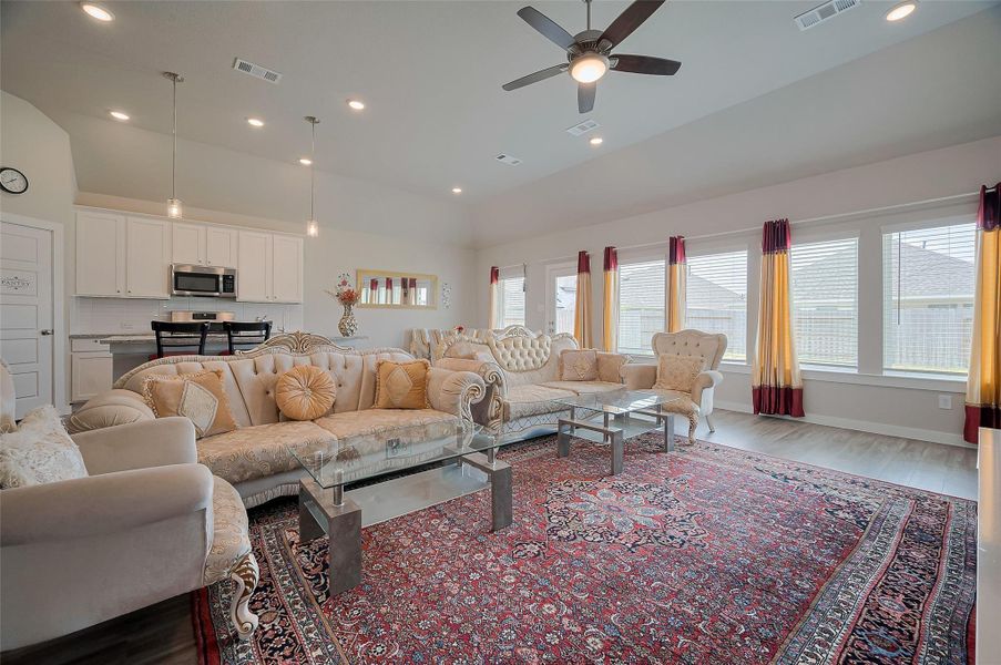 Open family room with connected dining space.