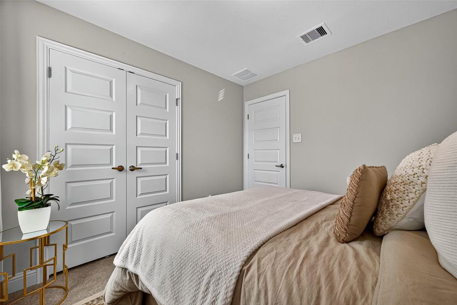 Furnished interior view inside a new home in Sunterra, Katy (Image 36).