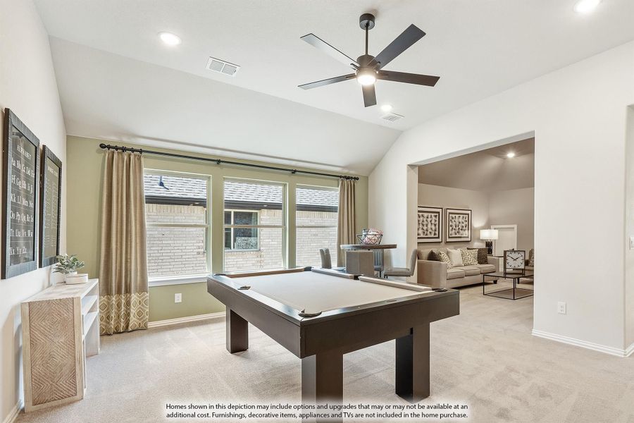Game room with pool table, ceiling fan, vaulted ceiling, and open view to living area