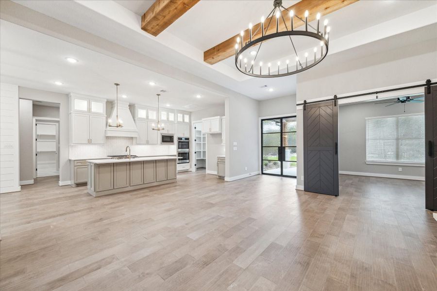 THE PICTURE SHOWN IS NOT THE ACTUAL HOME. TRINITY SIGNATURE HOMES IS BUILDING A SIMILAR FLOOR PLAN.