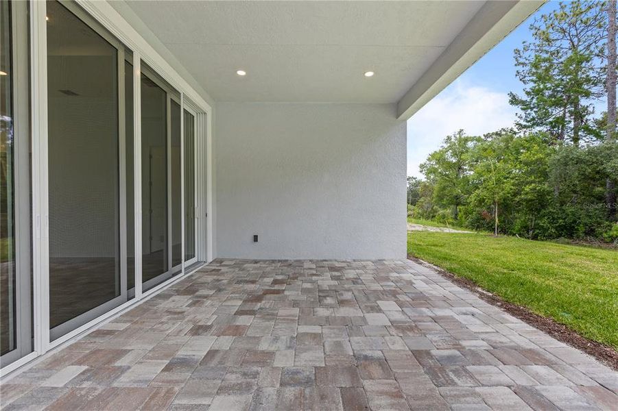Exterior details and patio area of a home in The Reserve at Victoria, Deland (Image 27).