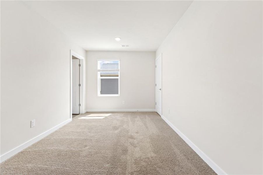 Spacious, unfurnished interior of a new home in Fern Dale, Fairburn (Image 13).