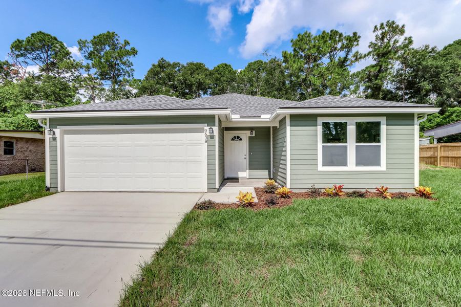 Front exterior of a new home in , Jacksonville, FL, highlighting curb appeal (Image 1). Front exterior of a new home in , Jacksonville, FL, highlighting curb appeal (Image 1).