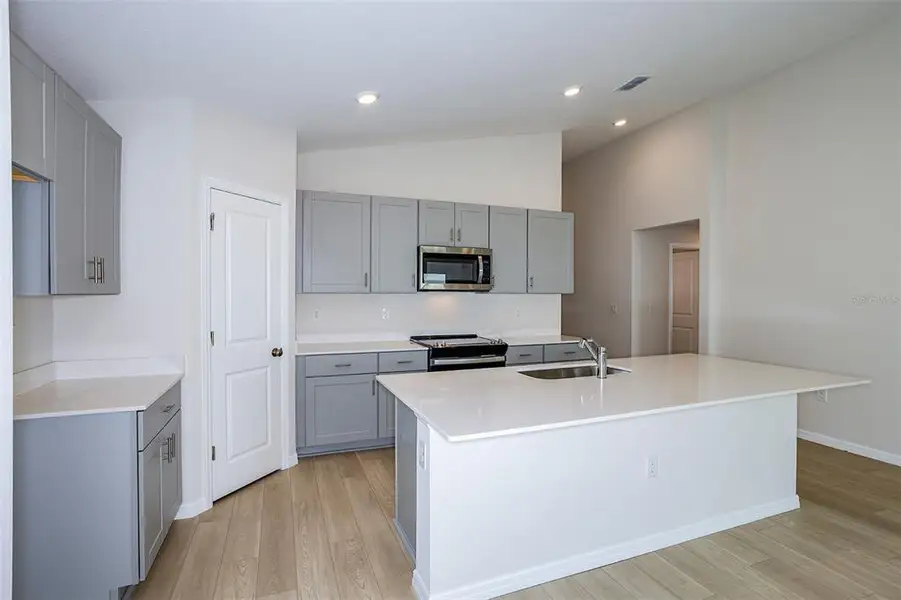 Furnished interior view inside a new home in Pasadena Landing, Wesley Chapel (Image 8). Furnished interior view inside a new home in Pasadena Landing, Wesley Chapel (Image 8).