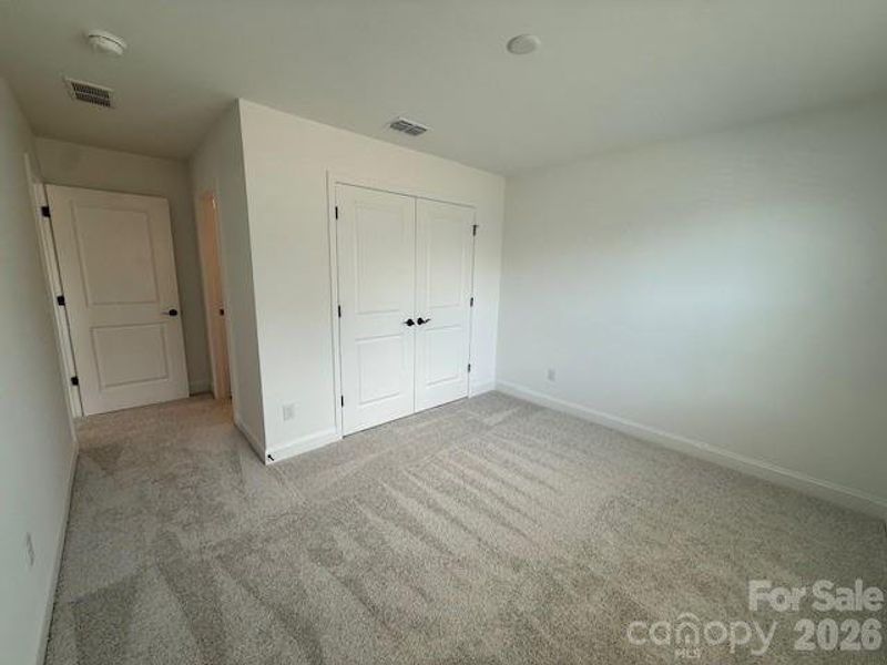 Secondary Bedroom with private bathroom.