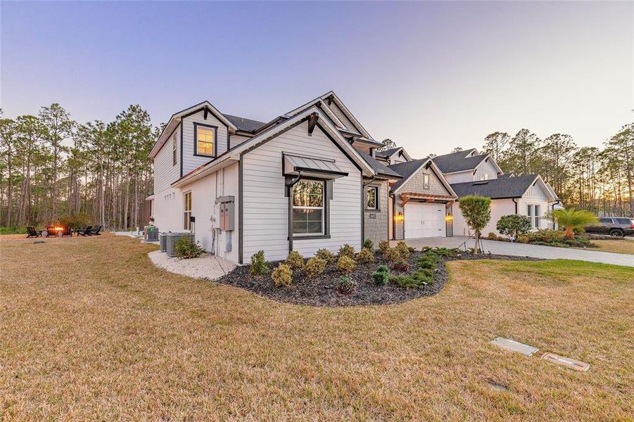 Front exterior of a new home in , Port Orange, FL, highlighting curb appeal (Image 1). Front exterior of a new home in , Port Orange, FL, highlighting curb appeal (Image 1).