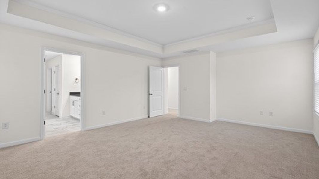 Representative unfurnished interior of a home built from the Tillery by D.R. Horton in The Estates Park, Apex (Image 29).