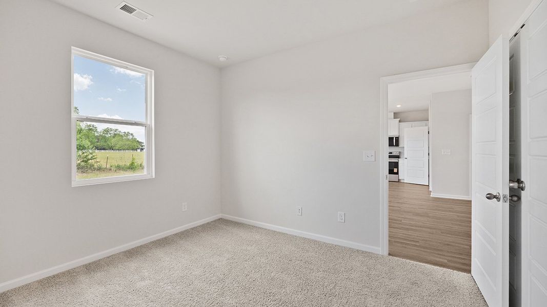 Representative unfurnished interior of a home built from the Edgewood Express - Duplex by D.R. Horton in Remington Chase, Perry (Image 20).