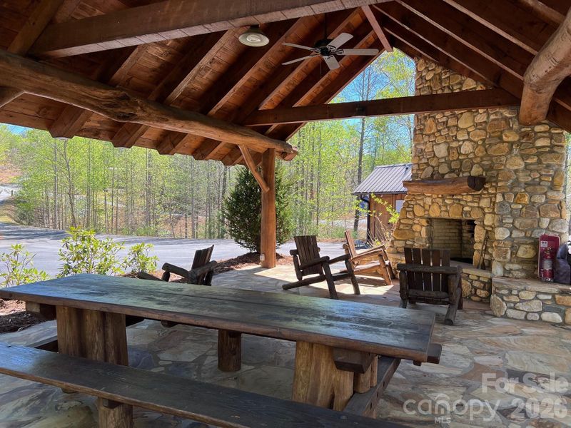 There are many amenities for The Arbor at Lake James. Here is one of them....the covered pavilion with a stone fireplace and picnic tables. There are many amenities for The Arbor at Lake James. Here is one of them....the covered pavilion with a stone fireplace and picnic tables.