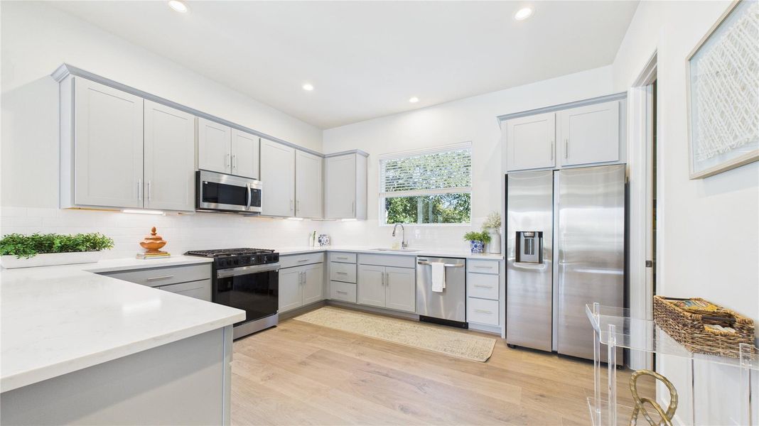 Kitchen big enough to dance in! Soft close cabinets and drawers.