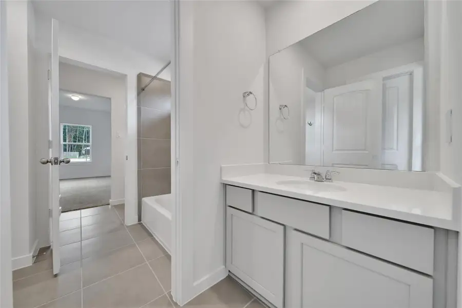 Furnished interior view inside a new home in Roman Forest, New Caney (Image 10).