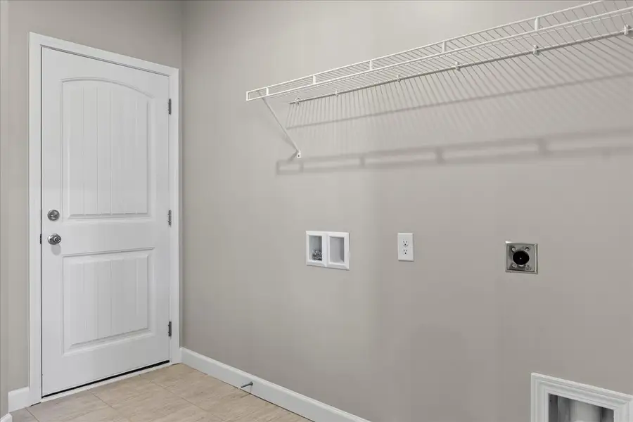 Representative unfurnished interior of a home built from the Cherokee by Enchanted Homes in Lonesome Dove, San Antonio (Image 38).