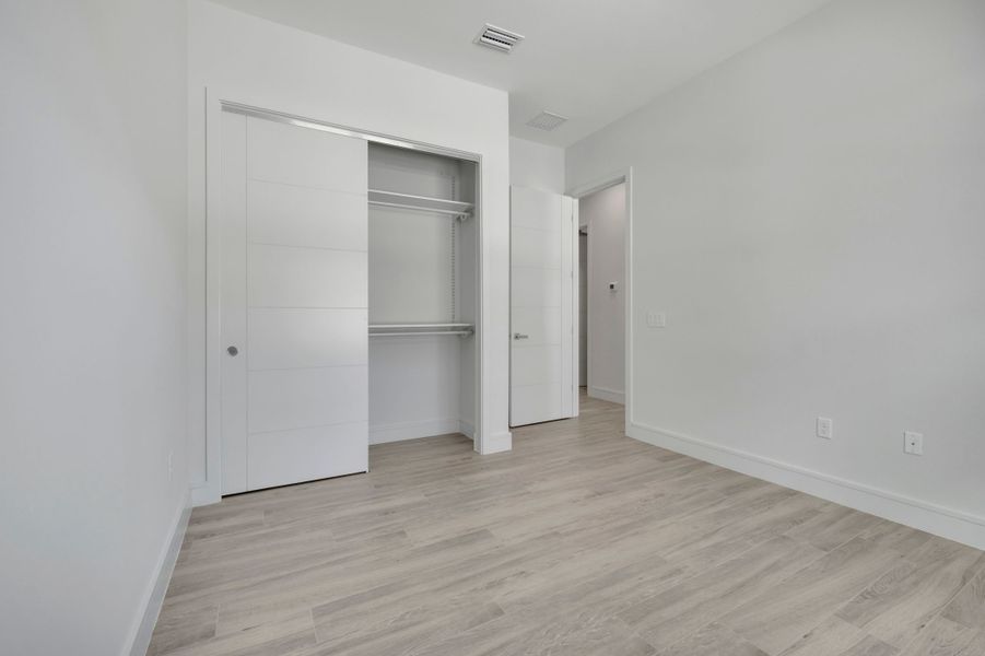 Representative unfurnished interior of a home built from the Marbella by ABD Development in Hampton Green at Providence, Davenport (Image 44).