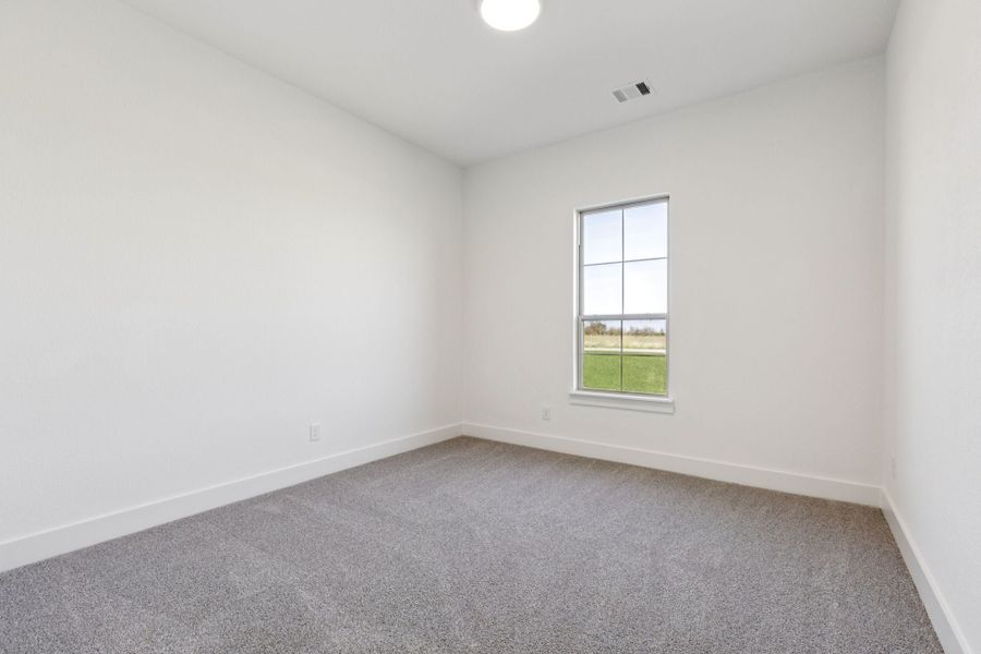 Representative unfurnished interior of a home built from the Halsted by Centre Living Homes in Lakeway Estates, Waxahachie (Image 28).