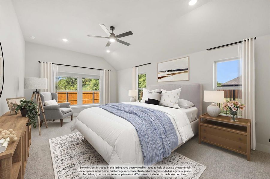 Master bedroom with vaulted ceiling, ceiling fan, carpet floors, and multiple windows with natural light
