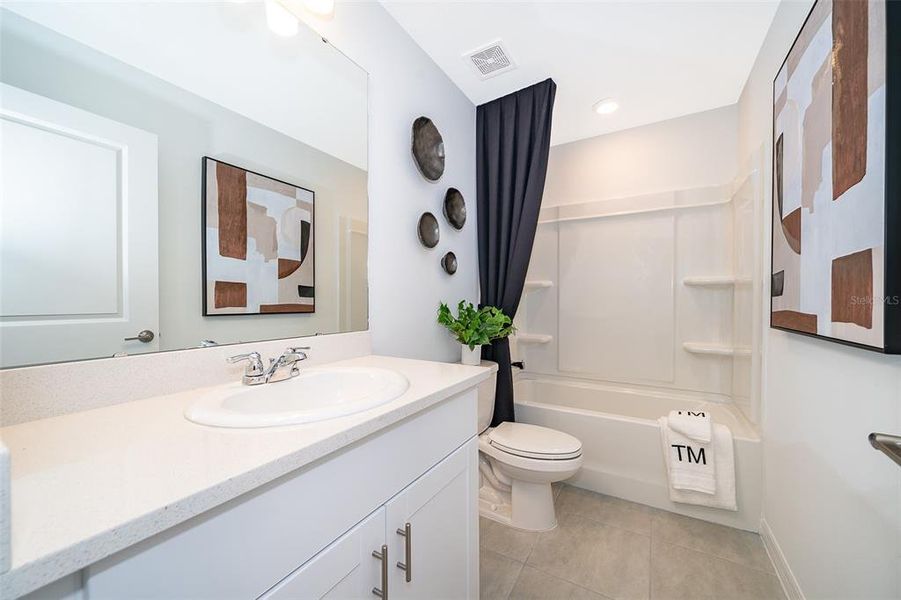 Furnished interior view inside a new home in Horse Creek at Crosswinds, Davenport (Image 5).