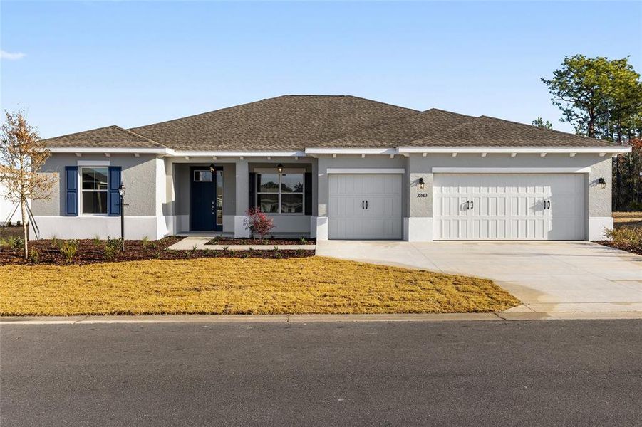 Front exterior of a new home in , Ocala, FL, highlighting curb appeal (Image 18).