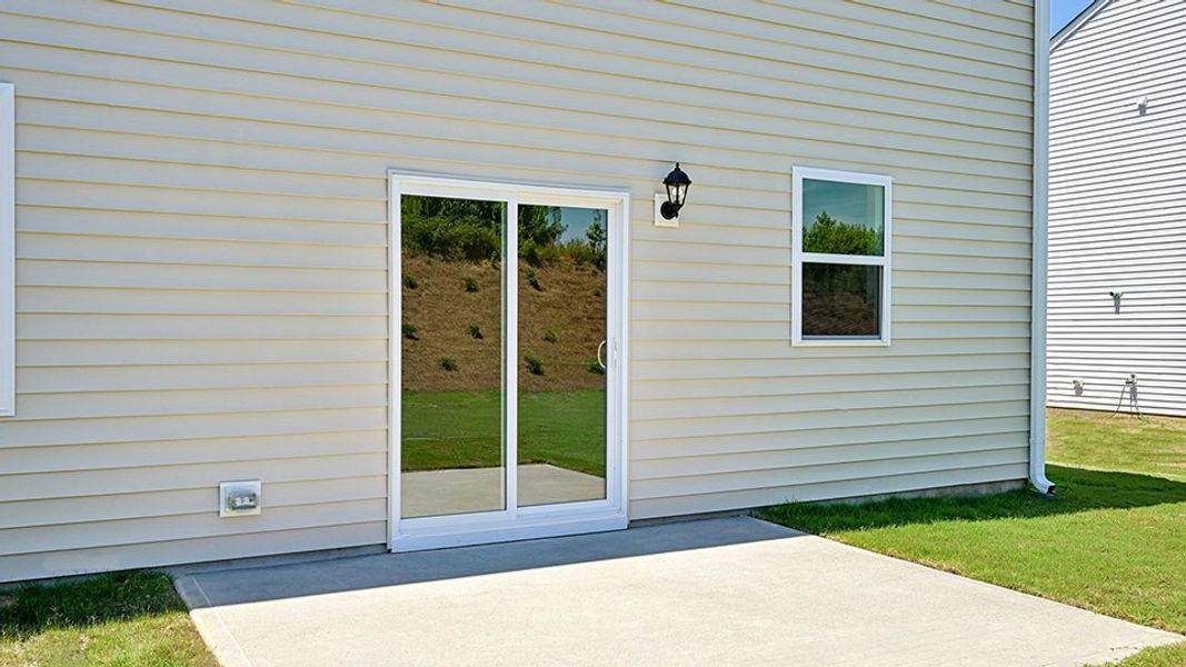 Exterior details and patio area of a home in Cross Creek, Spring Lake (Image 4). Exterior details and patio area of a home in Cross Creek, Spring Lake (Image 4).