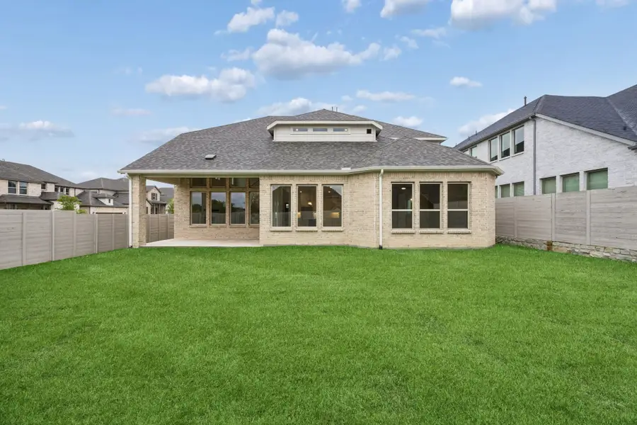 Exterior details and patio area of a home in Painted Tree Lakeside, McKinney (Image 3).
