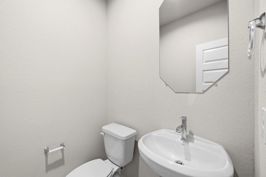 Furnished interior view inside a new home in Barton Creek Ranch, Conroe (Image 5).