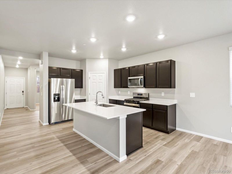 Furnished interior view inside a new home in Buffalo Highlands: The Flora Collection, Commerce City (Image 11). Furnished interior view inside a new home in Buffalo Highlands: The Flora Collection, Commerce City (Image 11).