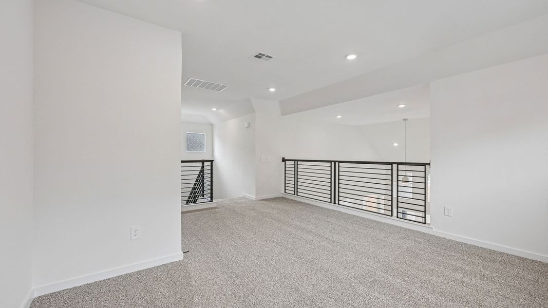 Spacious, unfurnished interior of a new home in The Enclave at Bar W Ranch, Leander (Image 27).