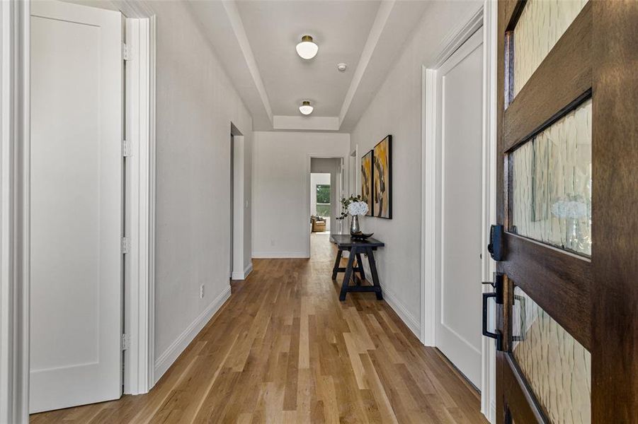 Corridor featuring light hardwood / wood-style flooring