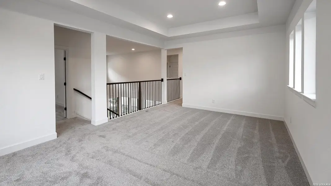 Spacious, unfurnished interior of a new home in Hidden Canyon, San Antonio (Image 14).