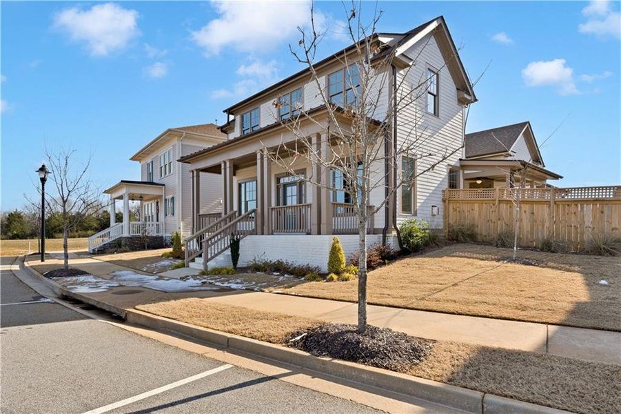 Front exterior of a new home in Eastmore, Conyers, GA, highlighting curb appeal (Image 25).