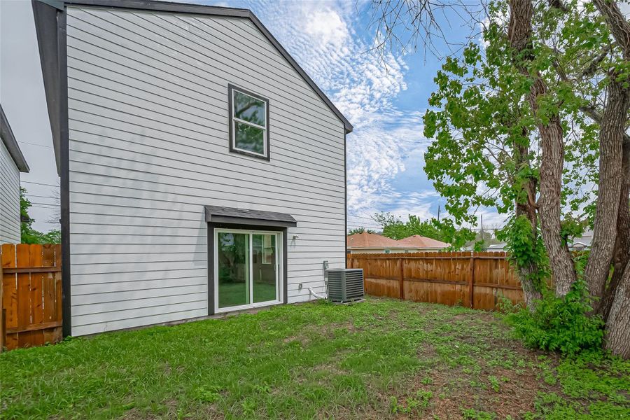 Exterior details and patio area of a home in , Houston (Image 4).