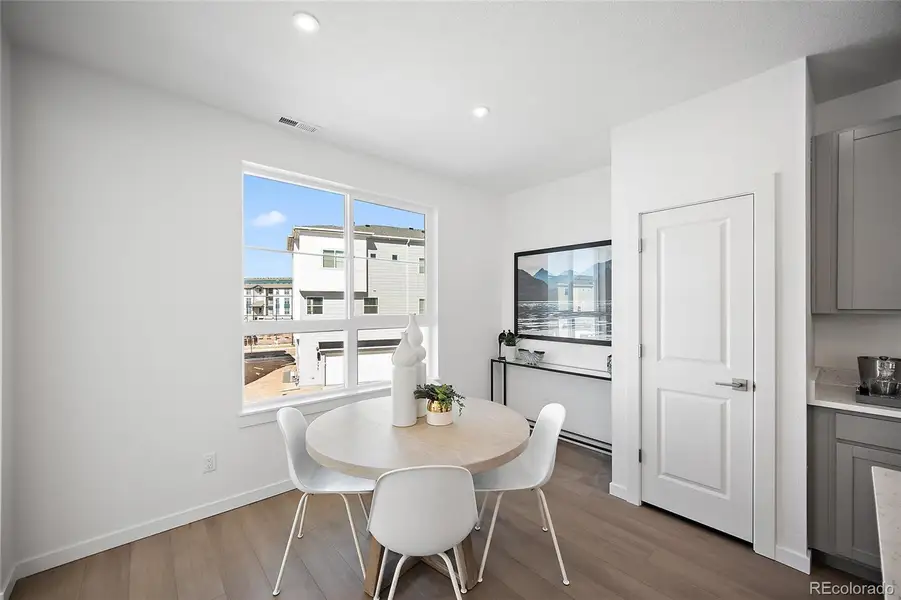 Furnished interior view inside a new home in The Commons at Victory Ridge, Colorado Springs (Image 3).