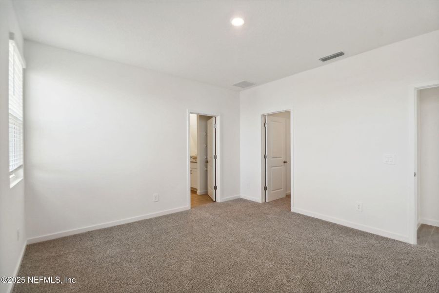 Spacious, unfurnished interior of a new home in Cypress Meadows - Signature Series, Jacksonville (Image 20).