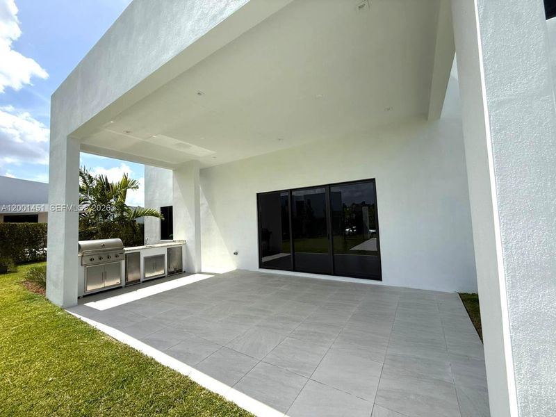 Exterior details and patio area of a home in , Weston (Image 4).