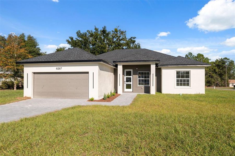 Front exterior of a new home in , Ocala, FL, highlighting curb appeal (Image 19).