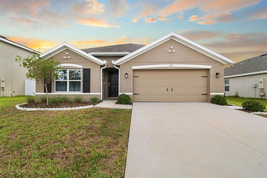 Front exterior of a new home in Brookside, Ruskin, FL, highlighting curb appeal (Image 31).