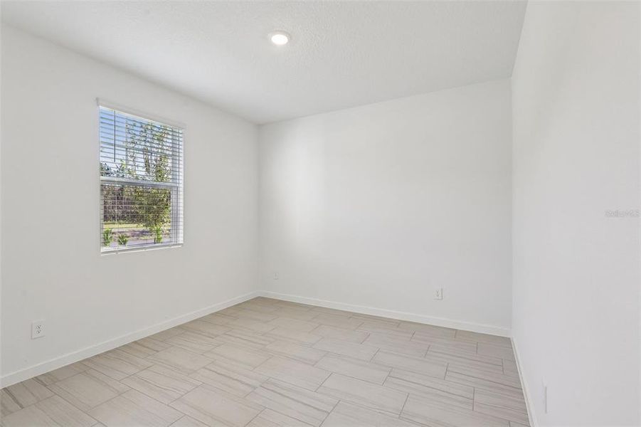 Spacious, unfurnished interior of a new home in Colbert Landings, Palm Coast (Image 20).