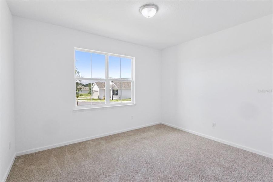 Spacious, unfurnished interior of a new home in Grand Isle, Grand Island (Image 13).