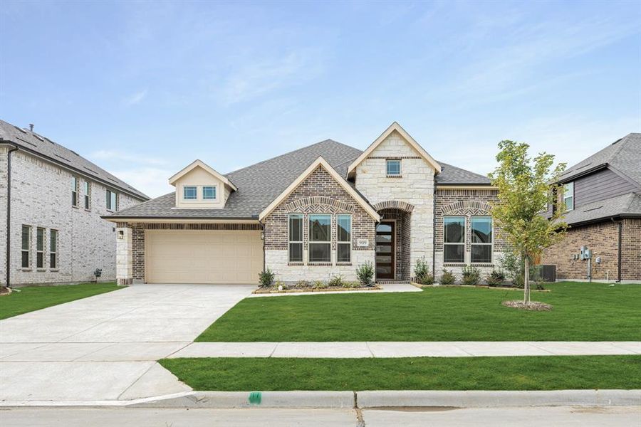 Front exterior of a new home in West Crossing, Anna, TX, highlighting curb appeal (Image 24). Front exterior of a new home in West Crossing, Anna, TX, highlighting curb appeal (Image 24).