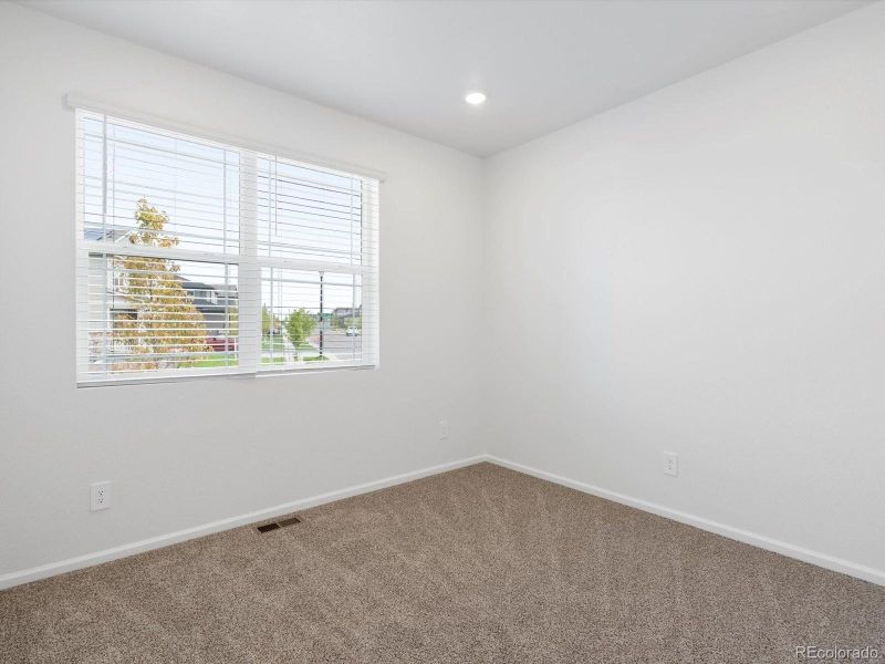 Spacious, unfurnished interior of a new home in Buffalo Highlands: The Canyon Collection, Commerce City (Image 15).