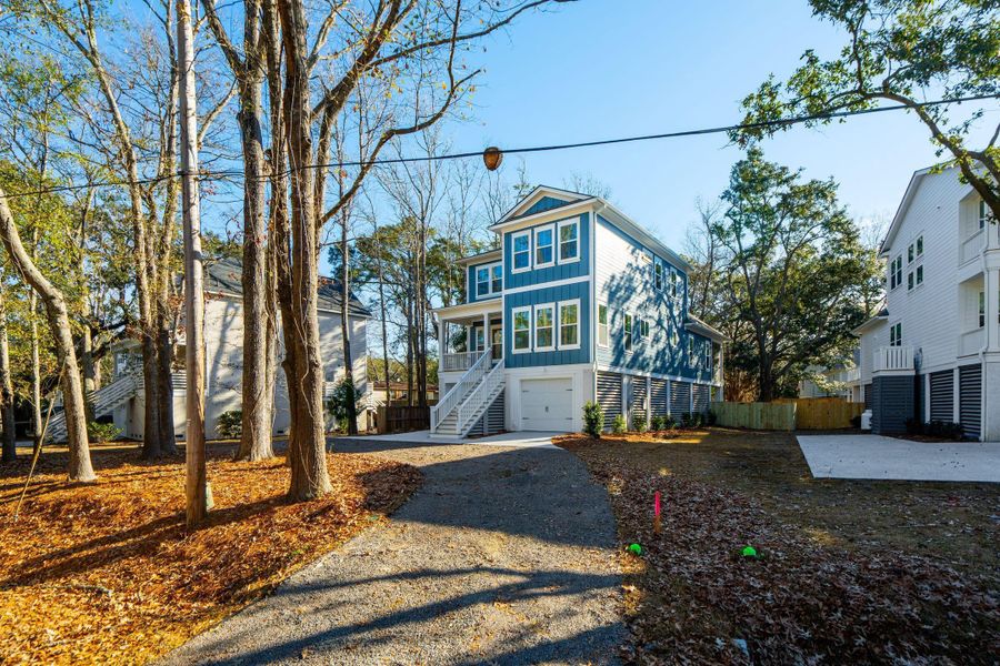 Front exterior of a new home in , Mount Pleasant, SC, highlighting curb appeal (Image 26).
