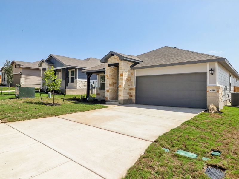 Front exterior of the Callaghan floorplan at a Meritage Homes community. Front exterior of the Callaghan floorplan at a Meritage Homes community.