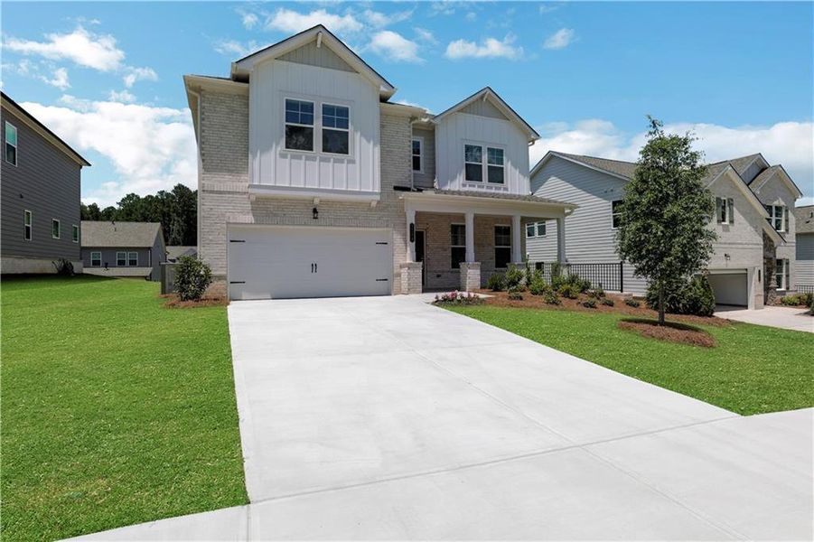 Front exterior of a new home in Bailey Fence, Dacula, GA, highlighting curb appeal (Image 21).