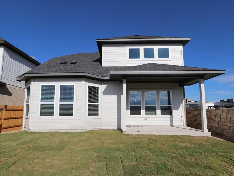 Exterior details and patio area of a home in Estancia West, Manchaca (Image 2).