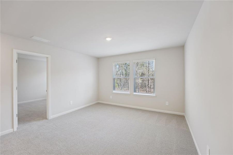 Spacious, unfurnished interior of a new home in Creekside at Oxford Park, Fairburn (Image 40).