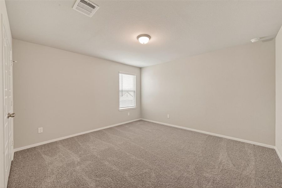 Spacious, unfurnished interior of a new home in Sunterra, Katy (Image 22).