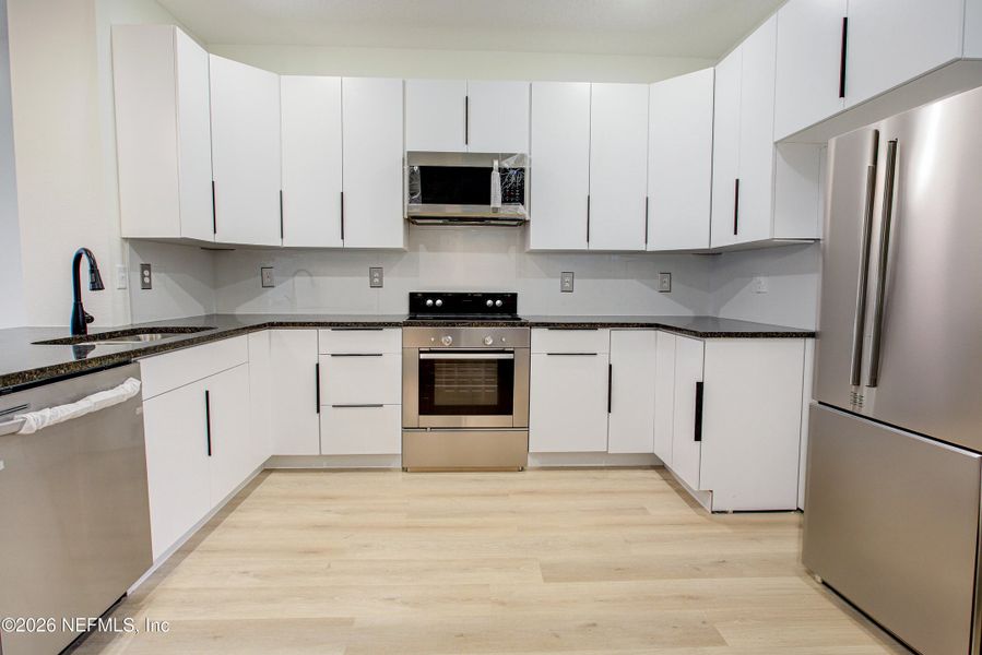 Furnished interior view inside a new home in , Jacksonville (Image 10). Furnished interior view inside a new home in , Jacksonville (Image 10).