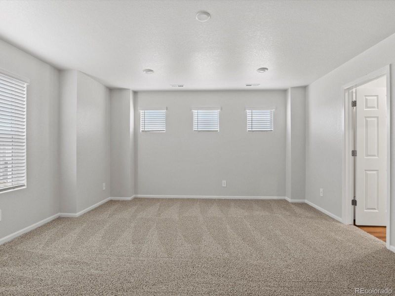 Spacious, unfurnished interior of a new home in Ridgeline Vista: The Flora Collection, Brighton (Image 31). Spacious, unfurnished interior of a new home in Ridgeline Vista: The Flora Collection, Brighton (Image 31).