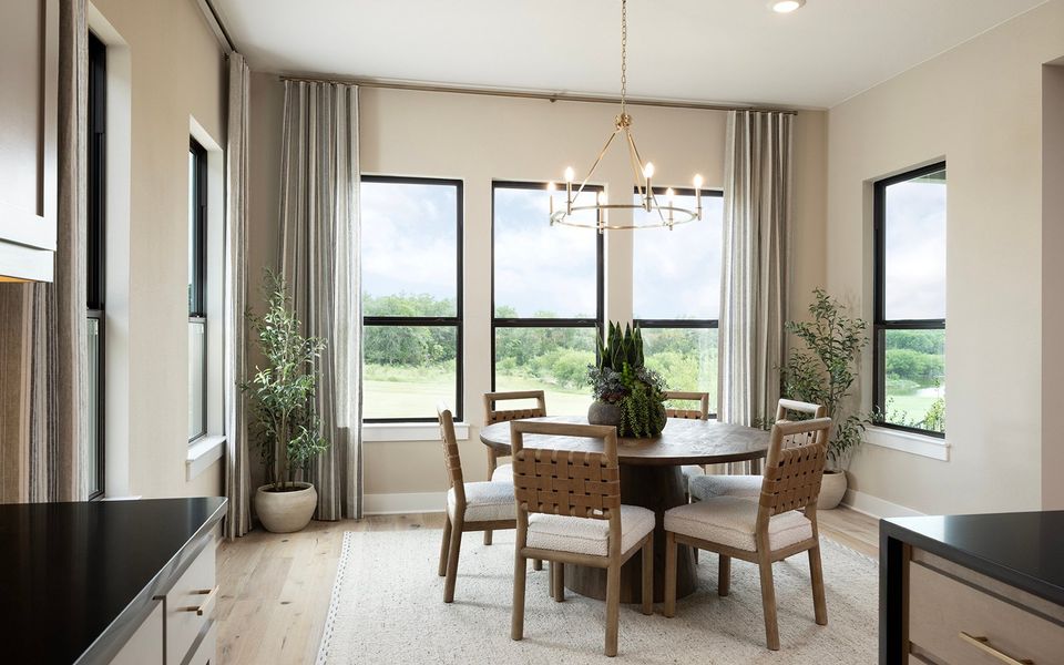 Representative furnished interior of a home built from the Champlain by Brookfield Residential in Kissing Tree, San Marcos (Image 12).