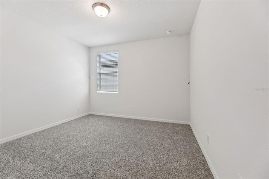 Spacious, unfurnished interior of a new home in Crosswinds - Signature Series, Haines City (Image 33).